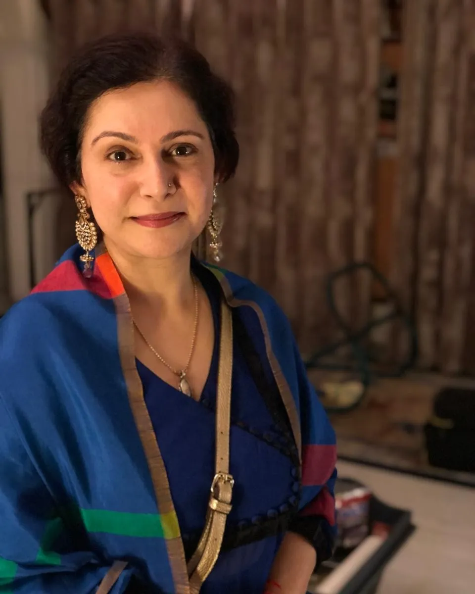Portrait of Shefali Chopra in a blue shawl